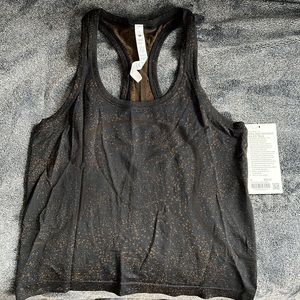 New with tags Swiftly Tech Racerback Tank 2.0 shorter Race length.